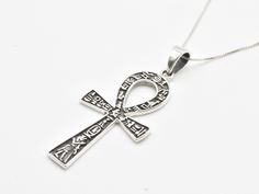 Ankh Cross Pendant made of Solid 925 Sterling Silver ☞ made to last.Matching Ring & Earrings ☞ please ask meDetails:• Silver Ankh Pendant• Dimensions: Pendant Height 55mm, Width 23mm• Free Complimentary Chain• Solid 925 Sterling SilverSKU P-01188 Ankh Pendant, Ankh Cross, Mother Rings, Matching Ring, Cute Gift Boxes, Support Handmade, Dream Jewelry, Boutique Jewelry, Chain Pendants