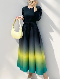 Inspired by the mesmerizing transition of hues seen in a sunset, this ombre pleated dress brings both elegance and whimsy to your wardrobe. Featuring puffy upper sleeves and crafted from authentic Japanese pleated fabric, it offers a loose, comfortable fit that moves with grace. Perfect for both casual outings and special occasions, this limited edition piece radiates modern sophistication and timeless beauty. Why You Need It Ombre Gradient: Stunning color transition. Puffy Sleeves: Adds dramatic flair. Loose Fit: Ensures comfort and movement. Japanese Pleated Fabric: Flows gracefully. Elegant and Modest: Versatile for any occasion. Limited Edition: Secure yours before it’s gone. Size Chart Measurements are in inches. Size Length Sleeve Length Bust Shoulder One Size 53.15 20.47 35.43-48.03 Gradient Color Summer Midi Dress, Chic Gradient Summer Dress, Gradient Maxi Dress For Evening, Spring Ombre Dress With Ruffles, Spring Ombre Midi Dress, Chic Ombre Spring Dress, Chic Ombre Dresses For Spring, Spring Gradient Maxi Dress, Elegant Ombre Dresses For Spring