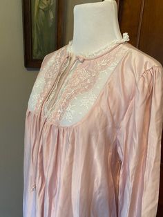 Vtg Repose long sleeve satin nightgown, cuddle soft, silky, warm, victorian, soft pink size M union, USA Gorgeous silky nightgown with cuddlesoft flannel inside. Victorian style, high quilted neck, lace ruffle trim No holes or stains Pit to pit: 19" Length: 54" Please note: items are in vintage/used condition and are being sold as-is. Please study the photos carefully and ask questions before purchasing. Additional measurements and/or photos are always available upon request. Thanks! Elegant Pink Long Sleeve Sleepwear, Spring Satin Nightgown For Wedding Night, Spring Wedding Night Satin Nightgown, Long Sleeve Nightgown For Spring Bedtime, Spring Long Sleeve Nightgown For Bedtime, Long Sleeve Satin Sleepwear For Spring, Feminine Long Sleeve Satin Sleepwear, Feminine Flowy Sleepwear, Long Sleeve Pink Nightgown For Spring