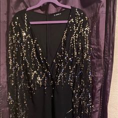 Party Sequins Jumpsuit Classy, Hot And Sexy All Wrapped Into One,With A Deep V Cut Neck Line & Gold Sequins On The Blouse Portion, Everyone Will Want To Know Your Name When You Walk Into The Room!! New Never Worn !!! 4x Fits Like A 3x Glamorous V-neck Jumpsuits And Rompers For Party, Glamorous V-neck Jumpsuit For Party, Black V-neck Jumpsuits For Party Season, Black Sequined Jumpsuit For Party, Black Jumpsuits And Rompers For Party Holiday, Black Jumpsuits And Rompers For Holiday Party, Black Holiday Party Jumpsuits And Rompers, Black Jumpsuit For Holiday Party, Black Jumpsuit For Party Season