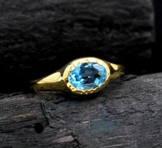 Gorgeous Swiss Blue Topaz Solitaire Ring made of solid 925 silver and gold plated hand made by skilled artisan.Beautiful Engagement Ring,Wedding Jewelry,Anniversary Ring Gift,An appreciated Christmas gift ring.It is a ring that would shine at any party as well as to wear for any formal meetings.It is a comfortable fit and adorable ring to have it as your own. Sku - MR1450 Style:- Ring Gemstone:- Swiss Blue Topaz Metal: 92.5 % Solid Sterling Silver Weight:-2 g Approx Stone Size:-7x5 mm Stone Shap Wedding Blue Topaz Hallmarked Rings, Topaz Solitaire Ring As A Gift, Blue Topaz Hallmarked Wedding Ring, Topaz Solitaire Ring Gift, Blue Topaz Wedding Ring Hallmarked, Hallmarked Topaz Promise Ring With Round Cut, Hallmarked Topaz Promise Ring Round Cut, Hallmarked Topaz Promise Ring, Heirloom Topaz Ring Gift