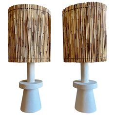 two lamps made out of bamboo sticks