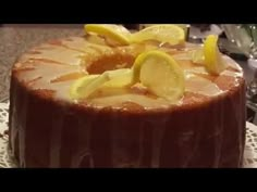 a chocolate cake with lemon slices on top