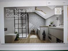 an advertisement for the neutrals collection is displayed on a computer screen in a bathroom