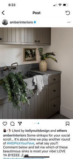 an image of a kitchen with grey cabinets and marble counter tops that is featured on instagram