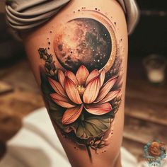 a woman's thigh with a flower and moon tattoo on the side of her leg