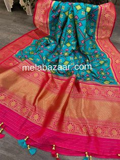 Gorgeous Patola dupatta with a grand Banarsi zari border. SILK MARK CERTIFIED Gorgeous weaving on a luxurious fabric. Size : 100 inches by 45 inches Luxury Bollywood Style Silk Mark Certified Dupatta, Luxury Silk Dupatta With Zari Weaving, Blue Katan Silk Dupatta With Printed Border, Blue Art Silk Dupatta With Printed Border, Multicolor Banarasi Silk Traditional Wear With Border, Festive Anarkali Dupatta With Printed Border, Festive Blue Dupatta With Printed Border, Multicolor Banarasi Silk Dupatta With Border, Multicolor Katan Silk Traditional Wear With Border