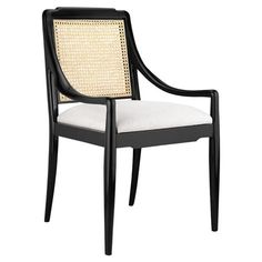 an upholstered chair with cane back and armrests in black wood, white fabric