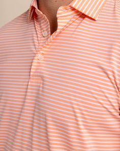 Classic stripes blend with modern coastal colors to craft a casual but considered polo. With striking color as far as the eye can see, the classic three-button placket, self-collar, and drop-tail hem construction keep it feeling sophisticated. Designed from quick-dry material with brrr° cooling technology, you'll feel ready for whatever the tide washes in. Style: 10621 Striped Collared Polo Shirt For Summer, Summer Striped Collared Polo Shirt, White Horizontal Stripe Polo Shirt For Summer, Summer Collared Polo Shirt With Horizontal Stripes, Spring Striped Polo Shirt, Casual Summer Polo Shirt With Horizontal Stripes, Striped Relaxed Fit Polo Shirt For Summer, Summer Striped Relaxed Fit Polo Shirt, Striped Polo Shirt With Polo Collar For Golf