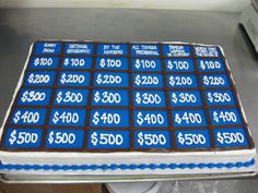 a sheet cake with blue and brown icing on it that has $ 500 in the middle