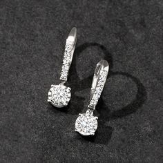 Ross-Simons - 1.00 ct. t. w. Diamond Drop Earrings in 14kt White Gold. Our classic drop earrings suspend .74 ct. t. w. round brilliant-cut diamonds from .26 ct. t. w. diamond-studded leverbacks of polished 14kt white gold. An enduring style that we consider a must, this pair will stay relevant and refined from now until forever! Hanging length is 7/8". Leverback, diamond drop earrings. Diamond birthstones are the perfect gift for April birthdays. Brilliant Cut Diamond Dangle Earrings For Anniversary, Classic Dangle Diamond Earrings With Accents, Classic Dangle Diamond Earrings For Anniversary, Gia Certified Drop Diamond Earrings For Formal Occasions, Classic White Gold Diamond Drop Earrings, Classic Gia Certified Dangle Jewelry, Classic Diamond Cut Dangle Earrings, Gia Certified Dangle Diamond Earrings In White Gold, Gia Certified Dangle White Gold Diamond Earrings