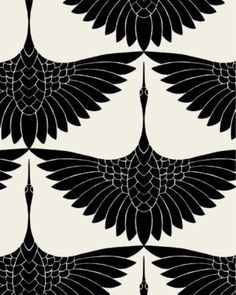 an abstract black and white pattern with large wings