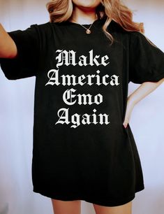 "This is the perfect gift for anyone who loves emo culture and music. Perfect gift for an elder emo with a bit of dark side Introducing our unique and captivating \"Make America Emo Again\" T-Shirt, featuring an eye-catching gothic font that adds an edgy and rebellious touch to this politically charged message. This shirt is the perfect blend of nostalgia, music, and social commentary, igniting conversations and celebrating the timeless spirit of the emo subculture. Crafted with care, this t-shirt offers both comfort and durability, ensuring it withstands the test of time. Whether you're an emo enthusiast, a music lover, or simply someone who believes in the power of self-expression, this shirt allows you to make a bold statement while embracing your individuality. Stand out from the crowd Make America Emo Again, Emo Mom Style, Emo Concert Outfit Punk Rock, Elder Emo Aesthetic, Emo Shirt Designs, Emo Nite Outfit, Adult Emo Fashion, Emo Party Outfit, Emo Night Party