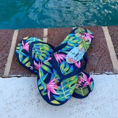 Nwt Air Balance Tropical Print Flip Flops. These Are Perfect For The Pool Or The Beach! They Have A Tropical Print On The Footbed And Solid Navy Toe Strap. These Will Get You In And Out Of The Hot Sand With Style And Ease! Blue Casual Outdoor Flip Flops, Casual Blue Flip Flops For Outdoor, Casual Pink Flip Flops For Pool, Casual Blue Flip Flops For Pool, Blue Fun Flip Flops For Vacation, Blue Tropical Style Flip Flops For Vacation, Fun Blue Flip Flops For Vacation, Tropical Style Multicolor Flat Flip Flops, Tropical Multicolor Flat Flip Flops