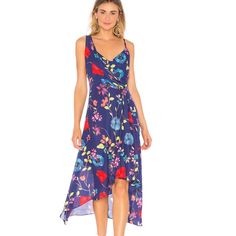 Vivid Florals Bloom On This Floaty Summer Dress. The Asymmetrical Neckline Features Gentle Draping Creating A Cool One Shoulder Effect. Fitted In The Waist And Lined Only To The Mid Thigh, This Style Drops To A Sheer High-Low Hem That Is Flirty And Fun. Back Zip Closure. 53% Silk, 47% Viscose. Blue Floral Print Dress With Asymmetrical Hem, Blue Asymmetrical Hem Dress With Floral Print, Spring Midi Dress With Asymmetrical Hem For Garden Party, Blue Midi Dress With Asymmetrical Floral Print Hem, Blue Asymmetrical Hem Dress For Spring, Blue Floral Print Maxi Dress With Asymmetrical Hem, Multicolor Asymmetrical Spring Dress, Blue Asymmetrical Hem Maxi Dress For Brunch, Blue Asymmetrical Spring Dress