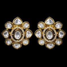 Kundan Studs or Polki Earrings showcase the intricate craftsmanship and timeless beauty of Indian jewelry. Moissanite Polki Stud Earrings an India Kundan Stud Earrings offer a modern twist to traditional designs. Uncut Polki Jewelry and Jadau Earrings exude opulence and sophistication. Polki Diamond Studs add a touch of glamour. Complete your ensemble with these captivating designs for a look that celebrates the rich heritage of Indian adornments and adds a stylish and elegant touch to any occas Kundan Earrings Studs, Kundan Studs Earrings, Polki Studs, Jadau Earrings, Kundan Studs, Sabyasachi Jewelry, Star Bangle, Kundan Jewellery Set, Jewelry Pakistani