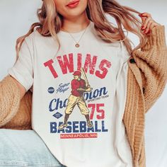 Step up to the plate in style with the "Vintage Baseball Team" Tee, showcasing iconic designs of your favorite MLB teams from the golden era of baseball. Crafted from premium fabric, this tee ensures both comfort and durability, making it perfect for honoring the rich history of America's favorite pastime. The vintage-inspired designs capture the nostalgia and heritage of classic MLB teams, bringing the spirit of the ballpark to your wardrobe. Whether you're cheering from the stands or reminiscing about baseball legends of yesteryear, this tee is the perfect choice for any fan. Its relaxed fit guarantees all-day comfort, while the authentic vintage designs add a touch of retro charm to your ensemble. From game days to casual outings, this tee is a versatile addition to your wardrobe, allow Collegiate Baseball Jersey With Graphic Print For Fans, Throwback Baseball Jersey With Letter Print, Throwback Short Sleeve Baseball Jersey With Letter Print, College Tops With Sublimation Print For Baseball Season, Throwback Letter Print T-shirt For College, Cotton Baseball Jersey With Letter Print For Fans, Throwback Baseball Fan Tops, Vintage Short Sleeve Tops For Baseball Season, Throwback Tops For Baseball Game Day