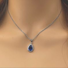 - New - Dainty Pear Shaped With White Cubic Zirconia Diamond Halo - Silver - Adjustable 16-18” Mannequin Is Life / Human Sized. Wear This For A Office Day Look, Wedding As Your Blue Item, Or A Chill Date Night. Small And Dainty! Tgs Pear Drop Halo Diamonds Swarovski Crystals Christmas Dress Gift Blue Dress Silver Accessories, Blue Silver Necklace, Elegant Blue Rhinestone Necklace Gift, Elegant Blue Crystal Rhinestone Necklace, Elegant Blue Rhinestone Necklace For Formal Occasions, Blue Rhinestone Necklace For Party, Blue Dresss, Silver Sparkly Dress, Dark Blue Jewelry