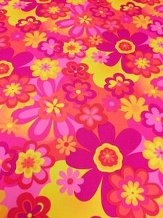 a pink and yellow floral print fabric