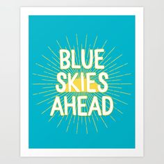 blue skies ahead art print with yellow and green sunbursts in the background