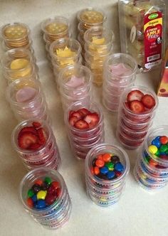 plastic cups filled with candy and gummy bears