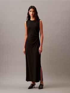 Cut in a flattering, elegant silhouette, this dress is accentuated by soft ruching details at the waist. Designed in a maxi length and fits closely to your shape. Made from smooth jersey fabric for a fluid touch.  Material: 100% Polyester. Elegant Calvin Klein Stretch Sleeveless Dress, Elegant Black Sleeveless Calvin Klein Dress, Khaite Sloan Draped Jersey Dress, Jersey Dress Black, Calvin Klein Fitted V-neck Sleeveless Dress, Gathered Dress, Jersey Fabric, Calvin Klein, Dress Outfits