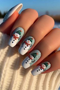 Cute Christmas character nails are a festive and playful way to celebrate the holiday season. Featuring designs like Santa, reindeer, snowmen, and elves, these nail art creations add charm and holiday cheer to your look. Perfect for all ages, they combine bright colors, glitter, and adorable details to create a fun and whimsical manicure that captures the magic of Christmas.#nail_tutorials
#nail_decoration
#nail_art_gallery
#nail_trend
#nails_trends
#nail_styles
#nails_design_acrylic
#nails_gel
#nails_simple
#nails_acrylic_designs Festival Nails Ideas, Snowman Christmas Nails, Nails With Snowman, White Christmas Nails, Snowman Nails, Christmas Nail Ideas, Glitter Accent Nails, Negative Space Nails, Christmas Gel