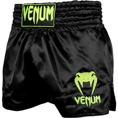 the venum boxing shorts are black and green