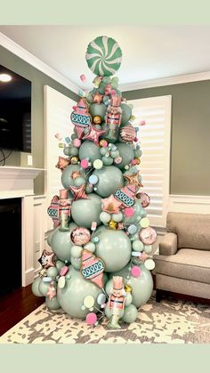 a christmas tree decorated with candies and lollipops