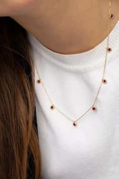 Welcome to PoshGoldJewelry, A new collection of necklaces are now available in our shop. Our gemstone chokers are dainty yet perfect for every woman. Necklace Information: - Material: 14K Solid Gold - Gemstone: CZ Simulated Ruby (Total of 7 stones) - Chain Thickness: 0.70mm - Size of each setting: 4mm A hallmark (stamp) of the material of your necklace will be included for certification. - Gift Box with each order! ✔️ You can contact us for the creation of your custom pendant. ✔️ Contact us for Red Ruby Round Necklaces, Dainty Adjustable Red Necklace, Red Ruby Gemstone Necklaces, Red Gemstone Round Necklace, Adjustable Red Dainty Necklace, Red Dainty Adjustable Necklace, Red Adjustable Dainty Necklace, Red Ruby Gemstone Necklace, Red Round Jewelry