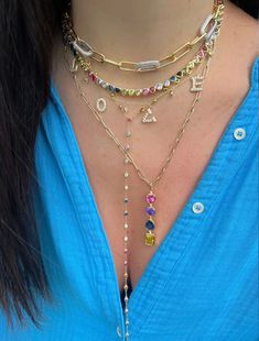 Add the perfect pop of color to your stack with this delicate diamond by the yard necklace with a rainbow twist. Product details: Measurements: 15.5 inches plus 2 inch extension 9 inch hanging lariat  Category: Necklaces - Lariat Finish: 18K Gold Plated over Brass Gem: Rainbow CZ THE PERFECT GIFT 🎁 💝 All Marie Rose Bijoux jewels are packed in an elegant jewelry box and ready to give as a gift (If you want to). A note from you will be gladly added.  Simply leave me a message with your personal note to include it in you package. Additionally a complementary luxury microfiber jewelry bag with jewelry cleaning cloth will be included. CARE TIPS:  Avoid the contact of your jewel with perfumes, creams, abrasive substances, excessive force and moisture. Store it in a dry place separately. The wa Adjustable Multicolor Lariat Necklace, Multicolor Gemstone Lariat Jewelry, Gold-tone Lariat Necklace For Layering, Gold-tone Lariat Necklace, Gold Multi-strand Lariat Necklace For Layering, Diamond By The Yard, Marie Rose, Multicolor Necklace, Jewelry Cleaning