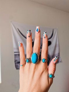 Turquoise Nails Western Cow Print, Western Theme Nails Cowboy Boots, Western Pedicure Designs, Koe Wetzel Concert Nails, Western French Tip Nail Ideas, Almond Shape Western Nails, Western Chic Nails, Turquoise Nail Design, Light Blue Western Nails