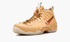 From Nike Sportswear's "5 Decades Of Basketball Pack", comprised of five sneakers from the 1970s through the 2010s, this Air Foamposite Pro in Vachetta Tan is a clean lifestyle version of a 90s classic.  Rose Gold on the Swoosh and matching accents further add to the luxury feel.  A Sail​-colored outsole and pull tabs complete the look. Buy Nike Shoes, Air Foamposite Pro, Foam Posites, Stadium Goods, Nike Fashion, Nike Basketball, New Sneakers, Mens Sportswear, Nike Sportswear