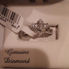 an engagement ring in a box with a price tag