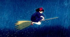 a person on a broom flying in the rain