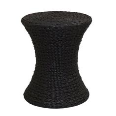 a black wicker stool on white background