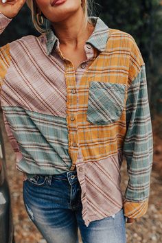 - Stroll through the pumpkin patch in this trendy button-up! - Unlined material with panels of different blue, yellow, and purple hued plaid prints - A collared neckline - A buttoned front - Frayed seam accents - A functional chest pocket - A relaxed silhouette that ends in a subtly rounded hemline Multicolor Casual Flannel Shirt For Fall, Casual Multicolor Flannel Shirt For Fall, Multicolor Tops With Button Closure For Fall, Multicolor Long Sleeve Flannel Shirt For Fall, Multicolor Button-up Top For Fall, Plaid Patchwork Tops For Fall, Casual Flannel Patchwork Tops For Fall, Fall Gingham Tops With Buttons, Yarn-dyed Button-up Tops For Fall