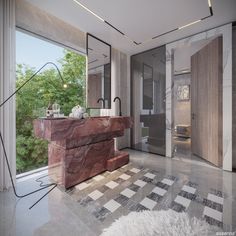 a bathroom with marble counter tops and flooring next to a large window overlooking the trees