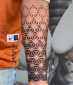 a person with a tattoo on their arm