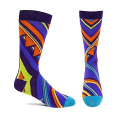 blue orange and lime green graphic socks on foot forms. Multicolor Retro Winter Socks, Fun Multicolor Socks For Spring, Fun Multicolor Spring Socks, Fun Multicolor Stretch Socks, Trendy Multicolor Socks For Spring, Fitted Multicolor Summer Socks, Fitted Multicolor Socks For Fall, Travel Tech, Blue Socks