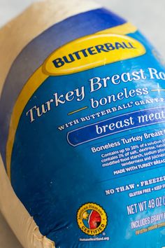 a bag of turkey breast is sitting on the counter top, ready to be cooked