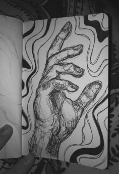 a drawing of a hand holding something in it's palm