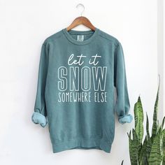 Looking for a cute versatile top to wear? Make sure to grab one of our Graphic Sweatshirts! This soft and comfortable shirt is the perfect top for any outfit. It can be paired with biker shorts, Jeans, or the classic stay at home sweats! This sweatshirt is true-to-size, so be sure to order your regular size! If you are looking for a more oversized look, make sure to size up. Cute Sweaters With Sayings, Winter Sweatshirt Designs, Holiday Sweatshirt Ideas, Winter Cricut Shirts, Distressed Cotton Top For Winter, Cozy Soft-washed Tops With Relaxed Fit, Cozy Soft-washed Relaxed Fit Tops, Winter Blue Washed Tops, Blue Washed Tops For Winter