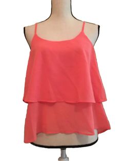 Introducing A Stylish Shirt Top From Thanth In A Beautiful Orangish Pink Color. This Blouse Is Perfect For Women Who Want To Add Some Pizzazz To Their Wardrobe. With A Regular Fit And Size Medium, This Shirt Is Sure To Flatter Any Figure. The Brand Thanth Is Known For Its Quality And Style, Making This Shirt A Must-Have For Any Fashion-Conscious Woman. The Shirt Is Ideal For Any Occasion, From A Casual Day Out To A Formal Event. Don't Miss Out On This Unique Blouse That Will Make You Stand Out F Casual Layered Tops For Spring, Layered Sleeveless Tops, Layered Sleeveless Top For Summer, Summer Layering Pink Blouse, Fitted Layered Tops For Spring, Layered Sleeveless Tops For Spring, Open Back Top, Unique Blouse, Stylish Shirt