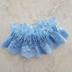 "Wonderful shower gift for the bride. Something blue to go with her wedding ensemble. The garter is made in a vintage corn silk blue lace and gathered with an elastic casing of matching blue satin ribbon. This is a classic design for a garter. This particular garter is 14\" stretching to 21\"." Bride Something Blue, Something Blue For Bride, Corn Silk, Elastic Casing, Lace Wedding Garter, Wedding Garter Lace, Blue Garter, Lace Choker Necklace, Fabric Earrings