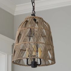 the light fixture is made out of wicker