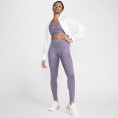 Push yourself forward with the right balance of support and comfort with our Nike Go leggings. Squat-proof—even during your toughest workouts—their sleek, midweight InfinaLock fabric feels compressive and supportive in all the right places. Multiple pockets let you carry everything you could need, whether you're hitting the trail, the gym or the mat. Functional Athletic Fit Tights For Training, Athletic Fit Training Tights, Athletic Fit Moisture-wicking Tights, Athletic Fit Moisture-wicking Functional Tights, Nike Moisture-wicking Tights For Training, Nike Moisture-wicking Training Tights, Nike Yoga Pants For Sports, Nike Training Tights Sportswear, Nike Sportswear Tights For Training