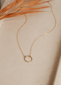 We love jewelry we can live in. Like this Full Circle Necklace. Wear it alone or layered with your favorite delicate choker. Circle measures just over 1/2" wide. Available in Sterling Silver or 14kt Gold Fill. Handmade in Eau Claire, WI All of our jewelry is handmade to order just for you so each piece will be unique and may vary slightly from what is pictured. Due to its handmade nature, please allow 3-5 business days for orders to ship. Adjustable Simple Everyday Necklace, Minimalist Full Circle Necklace With Delicate Chain, Delicate Chain Necklace For Everyday, Everyday Full Circle Necklace With Delicate Chain, Dainty Clavicle Chain With Open Circle Pendant, Dainty Open Circle Clavicle Chain Jewelry, Everyday 14k Gold Open Circle Jewelry, Delicate Full Circle Necklace For Everyday, Everyday 14k Gold Full Circle Jewelry