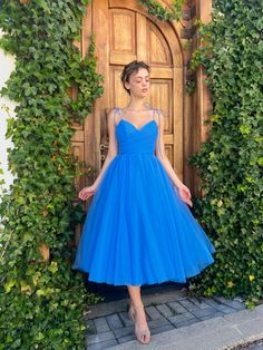 Cerulean Sea Tulle Gown | Teuta Matoshi Homecoming Dresses Yellow, Evening Gowns Short, Blue Tulle Prom Dress, Ball Gowns Vintage, Tea Length Prom Dress, Red Homecoming Dresses, Spaghetti Strap Prom Dress, Evening Dresses Short