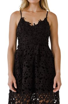 Floral lace embroidery beautifully covers the fit-and-flare silhouette of a sleeveless midi dress with scalloped trim and hidden pockets at the sides. 100% polyester Hand wash, dry flat Imported Black Sleeveless Lace Dress With Delicate Details, Sleeveless Mini Dress With Delicate Lace, Summer Lace Dress With Lace Closure For Date Night, Black Spaghetti Strap Dress With Lace Closure, Sleeveless Scalloped Lace Dress For Night Out, Sleeveless Delicate Lace Dress For Night Out, Black Dress With Lace Closure And Spaghetti Straps, Chic Sleeveless Dress With Delicate Lace, Sleeveless Spring Dress With Lace Closure